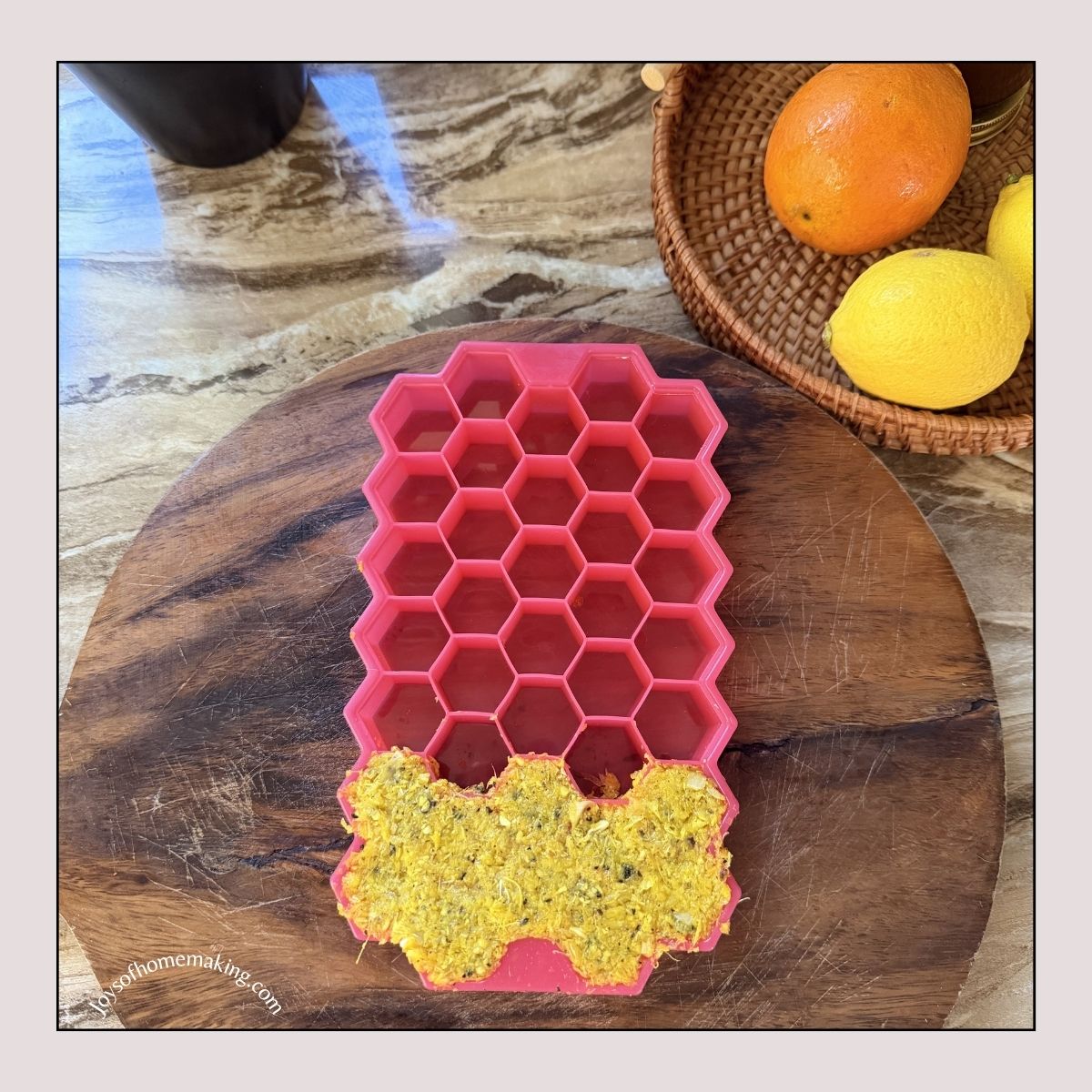 wellness shot pulp in a pink silicone container